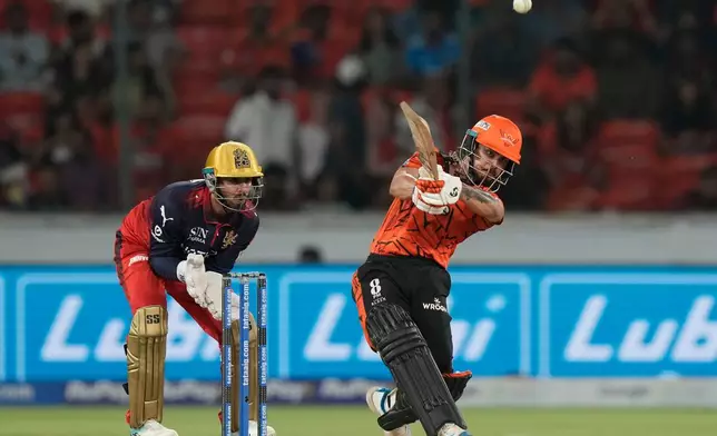 Sunrisers Hyderabad's captain Ishan Kishan hits a six during the Indian Premier League cricket match between Sunrisers Hyderabad and Royal Challengers Bengaluru in Hyderabad, India, Friday, May 22, 2026. (AP Photo/Mahesh Kumar A.)