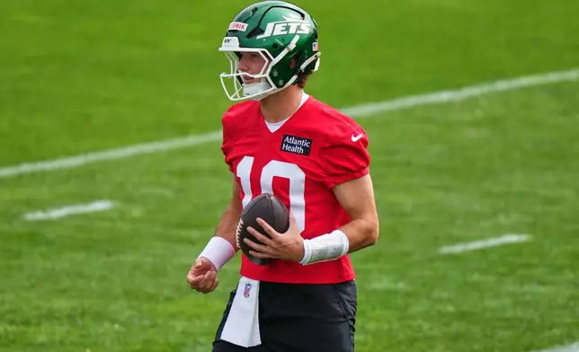 New York Jets quarterback Cade Klubnik takes part in drills during rookie minicamp at the NFL football team's practice facility Friday, May 8, 2026, in Florham Park, N.J. (AP Photo/Frank Franklin II)