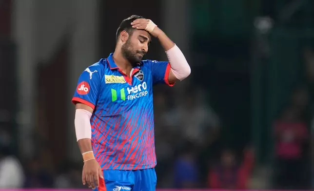 Delhi Capitals' Vipraj Nigam reacts after getting hit for consecutive sixes during the Indian Premier League cricket match between Delhi Capitals and Kolkata Knight Riders in New Delhi, India, Friday, May 8, 2026. (AP Photo/Manish Swarup)