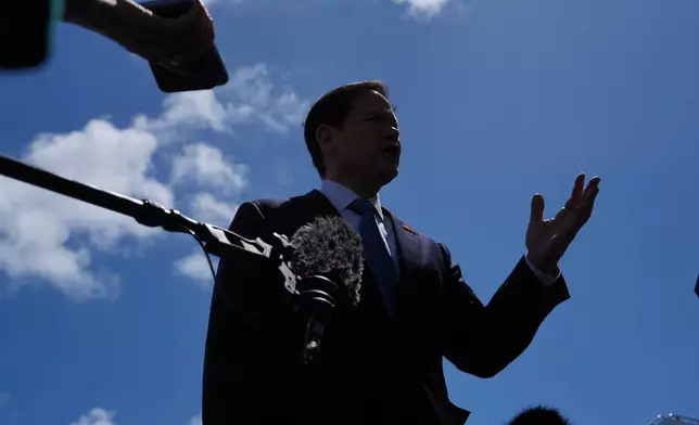 Secretary of State Marco Rubio speaks to the press before boarding his plane at Homestead Air Reserve Base, Thursday, May 21, 2026. Rubio is traveling to a NATO foreign ministers meeting in Sweden. (AP Photo/Julia Demaree Nikhinson, Pool)