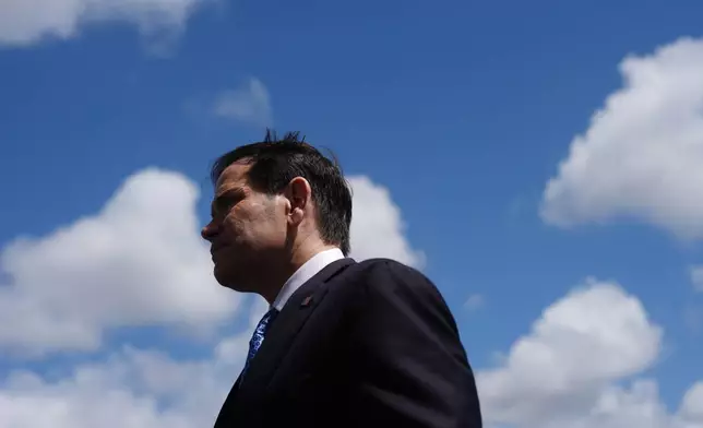 Secretary of State Marco Rubio speaks to the press before boarding his plane at Homestead Air Reserve Base, Thursday, May 21, 2026. Rubio is traveling to a NATO foreign ministers meeting in Sweden. (AP Photo/Julia Demaree Nikhinson, Pool)