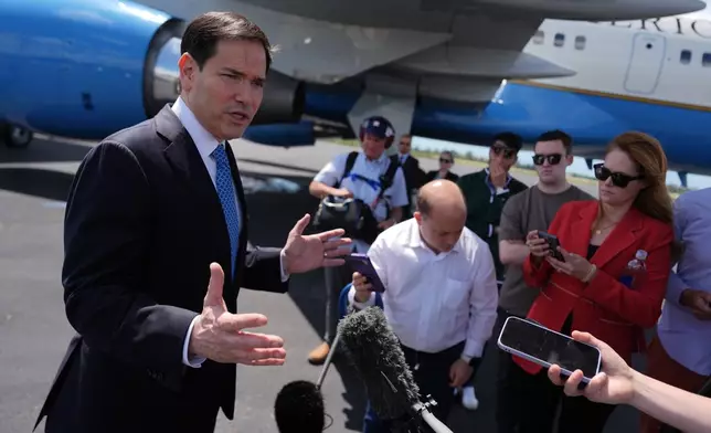 Secretary of State Marco Rubio speaks to the press before boarding his plane at Homestead Air Reserve Base, Thursday, May 21, 2026. Rubio is traveling to a NATO foreign ministers meeting in Sweden. (AP Photo/Julia Demaree Nikhinson, Pool)