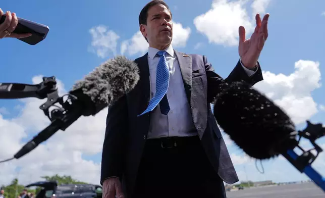 Secretary of State Marco Rubio speaks to the press before boarding his plane at Homestead Air Reserve Base, Thursday, May 21, 2026. Rubio is traveling to a NATO foreign ministers meeting in Sweden. (AP Photo/Julia Demaree Nikhinson, Pool)