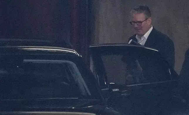 Britain's Prime Minister Keir Starmer enters his car to leave after delivering a speech at the Coin Street Neighbourhood Centre in Waterloo, London, Monday, May 11, 2026.(AP Photo/Kin Cheung)
