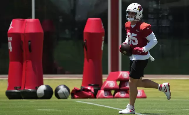 Arizona Cardinals tight end Trey McBride participates in the NFL football team's practice, Wednesday, May 27, 2026, in Tempe, Ariz. (AP Photo/Rick Scuteri)