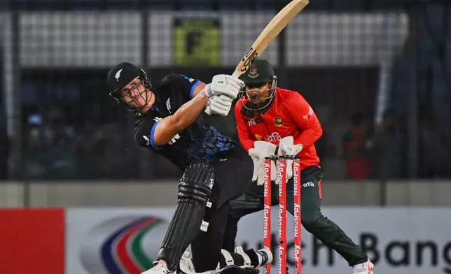New Zealand's Bevon Jacobs plays a shot during the third T20 international cricket match between Bangladesh and New Zealand in Mirpur, Bangladesh, Saturday, May 2, 2026. (AP Photo/Mosaraf Hossain)