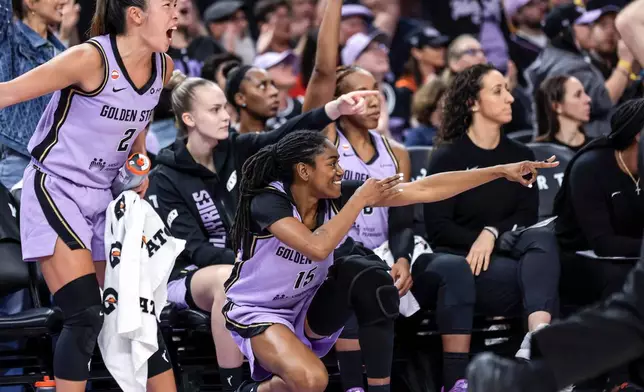 The Golden State Valkyries bench reacts to a teammate's basket during the first half of a WNBA basketball game against the Indiana Fever in San Francisco on Thursday, May 28, 2026. (Carlos Avila Gonzalez/San Francisco Chronicle via AP)