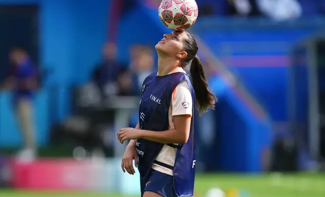 Barcelona's Kika Nazareth plays with a ball during a training session on the eve of the Women's Champions League final soccer match between FC Barcelona and OL Lyonnes, in Oslo, Friday, May 22, 2026. (AP Photo/Kirsty Wigglesworth)