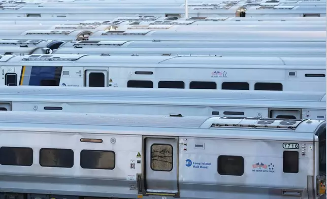 Long Island Rail Road trains sit in the West Side Yard on the first day of a strike, Saturday, May 16, 2026, in New York. (AP Photo/Heather Khalifa)