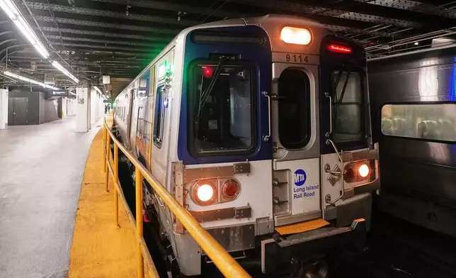 The first departing Long Island Rail Road train leaves Pennsylvania Station, in New York, Tuesday, May 19, 2026. (AP Photo/Richard Drew)
