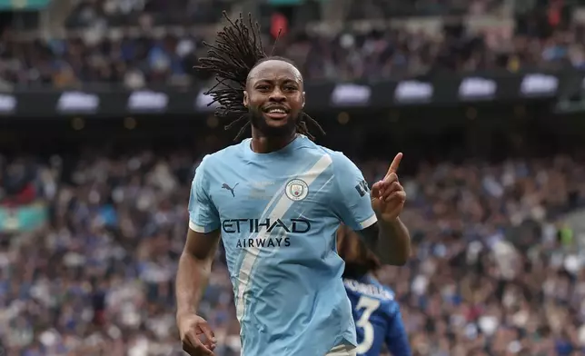 Manchester City's Antoine Semenyo celebrates after scoring the opening goal during the English FA Cup final soccer match between Chelsea and Manchester City in London, Saturday, May 16, 2026. (AP Photo/Richard Pelham)