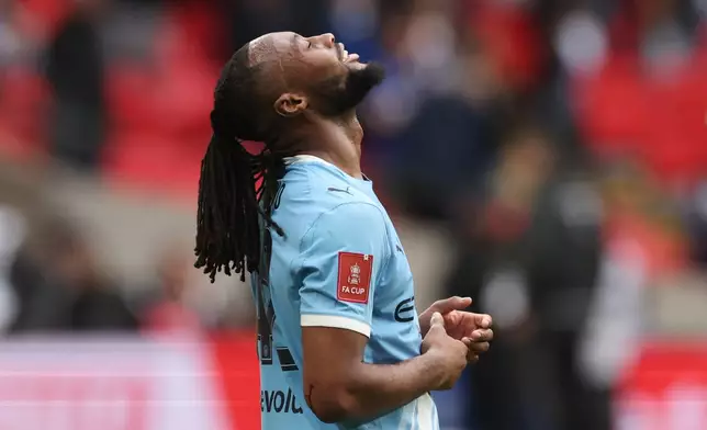 Manchester City's Antoine Semenyo celebrates after winning the English FA Cup final soccer match between Chelsea and Manchester City in London, Saturday, May 16, 2026. (AP Photo/Richard Pelham)