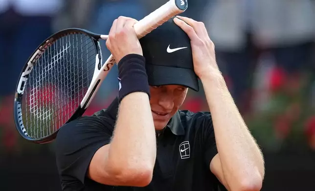 Jannik Sinner, of Italy, reacts after defeating Casper Ruud, of Norway, 6/4, 6/4 in the final match at the Italian Open tennis tournament, in Rome, Sunday, May 17, 2026. (AP Photo/Andrew Medichini)