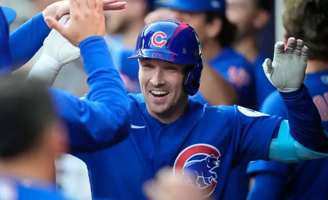 Chicago Cubs' Alex Bregman (3) celebrates hitting a solo homerun against the Atlanta Braves in the third inning of a baseball game, Tuesday, May 12, 2026, in Atlanta. (AP Photo/Mike Stewart)