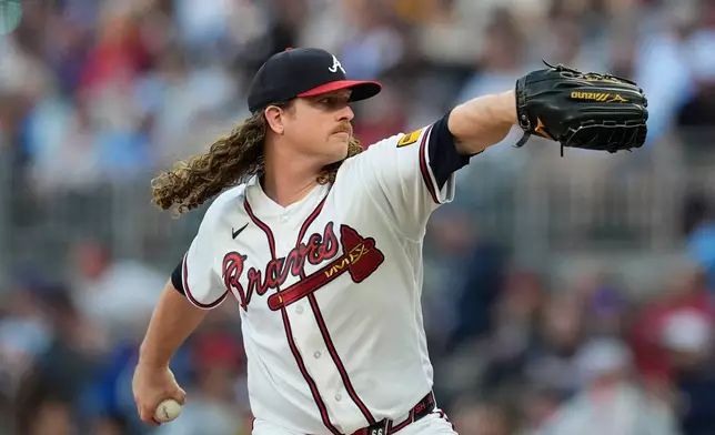 Atlanta Braves pitcher Grant Holmes (66) works in the third inning of a baseball game against the Chicago Cubs, Tuesday, May 12, 2026, in Atlanta. (AP Photo/Mike Stewart)