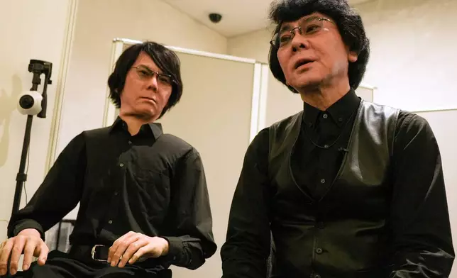 Professor Hiroshi Ishiguro, right, of Osaka University talks to android robot Geminoid at the Humanoids Summit 2026 in Tokyo, Thursday, May 28, 2026. (AP Photo/Ayaka McGill)