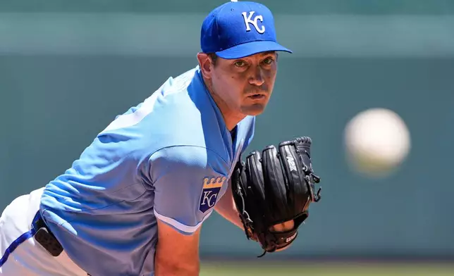 Kansas City Royals starting pitcher Seth Lugo throws during the first inning of a baseball game against the Seattle Mariners, Sunday, May 24, 2026, in Kansas City, Mo. (AP Photo/Charlie Riedel)