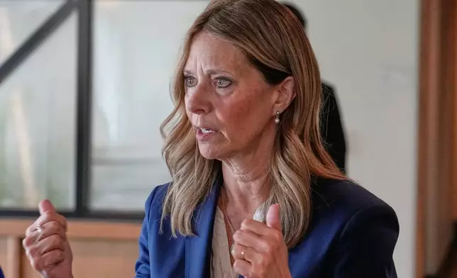 FILE - Amy Acton, Democratic candidate for Governor of Ohio, gestures as she speaks with a reporter in Columbus, Ohio April 15, 2026. (AP Photo/Sue Ogrocki, File)