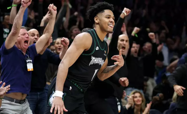 Minnesota Timberwolves guard Terrence Shannon Jr. (1) celebrates his three-point basket against the Denver Nuggets during the second half of Game 6 of a first-round NBA basketball playoffs series, Thursday, April 30, 2026, in Minneapolis. (AP Photo/Matt Krohn)