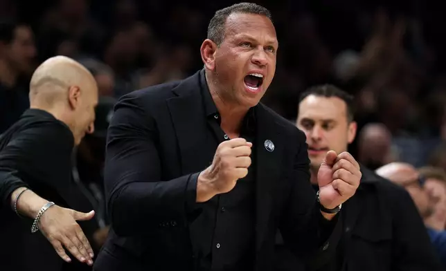 Minnesota Timberwolves co-owner Alex Rodriguez celebrates during the second half of Game 6 of a first-round NBA basketball playoffs series against the Denver Nuggets, Thursday, April 30, 2026, in Minneapolis. (AP Photo/Matt Krohn)