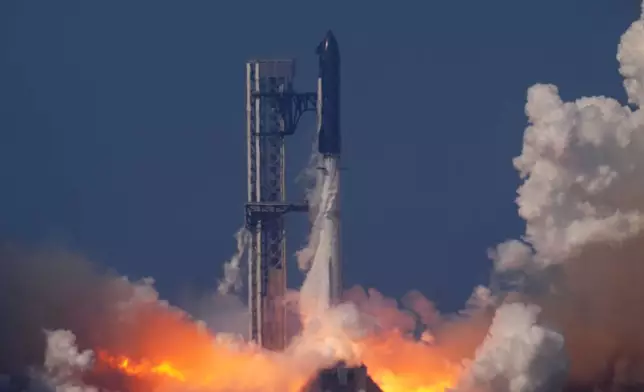 SpaceX's mega rocket Starship makes a test flight from Starbase, Texas, Friday, May 22, 2026. (AP Photo/Eric Gay)