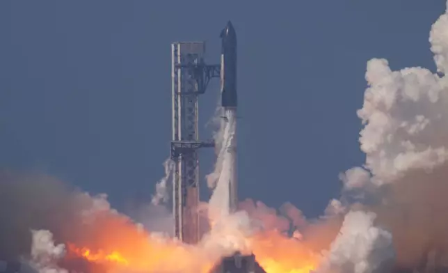 SpaceX's mega rocket Starship makes a test flight from Starbase, Texas, Friday, May 22, 2026. (AP Photo/Eric Gay)