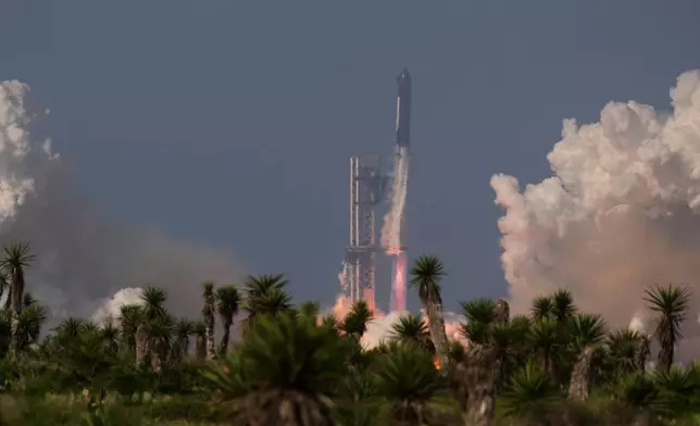 SpaceX's mega rocket Starship makes a test flight from Starbase, Texas, Friday, May 22, 2026. (AP Photo/Eric Gay)