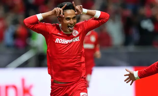 Toluca's Jorge Díaz celebrates scoring his side's opening goal against Tigres during the CONCACAF Champions Cup final soccer match in Toluca, Mexico, Saturday, May 30, 2026. (AP Photo/Fernando Llano)