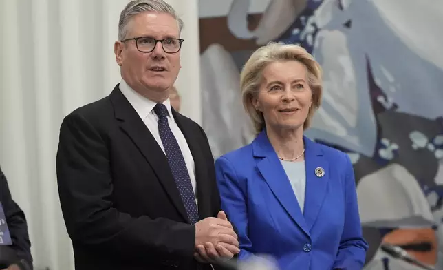 Britain's Prime Minister Keir Starmer, left, and President of the European Commission Ursula von der Leyen attend the European Political Community summit in Yerevan, Armenia, Monday May 4, 2026. (Stefan Rousseau/Pool Photo via AP)