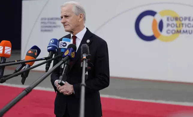 Norway's Prime Minister Jonas Gahr Store speaks with the media as he arrives for a meeting of the European Political Community in Yerevan, Armenia, Monday, May 4, 2026. (AP Photo/Anthony Pizzoferrato)