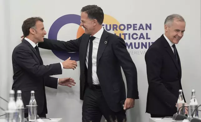 France's President Emmanuel Macron, from left, NATO Secretary General Mark Rutte and Canada's Prime Minister Mark Carney attend the European Political Community summit in Yerevan, Armenia, Monday May 4, 2026. (Stefan Rousseau/Pool Photo via AP)