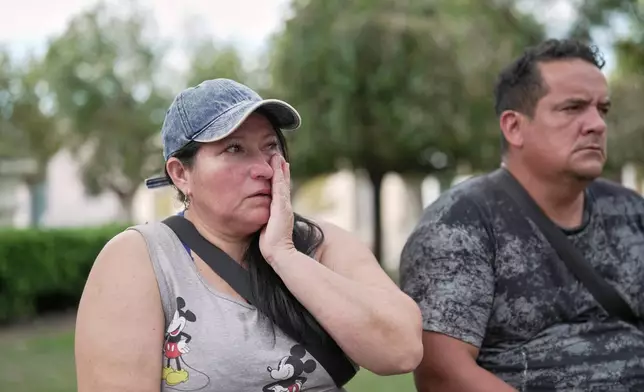 Daisy Morinigo sits with her husband David Delgado as she speaks about their son Rodrigo Morinigo, who died in January of hantavirus, in San Andres de Giles, Argentina, Wednesday, May 6, 2026. (AP Photo/Victor R. Caivano)