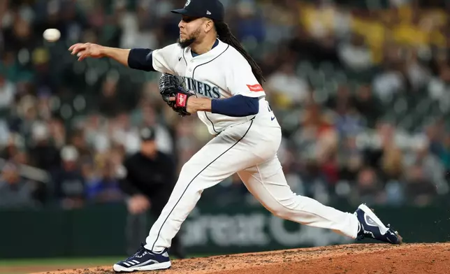 Seattle Mariners pitcher Luis Castillo throws in the eighth inning of a baseball game against the Chicago White Sox, Tuesday, May 19, 2026, in Seattle. (AP Photo/Kevin Ng)