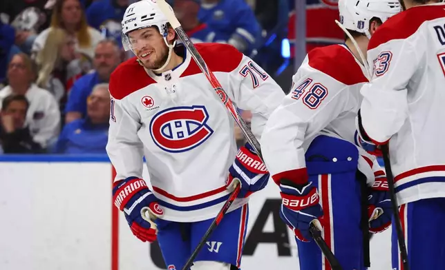 Montreal Canadiens center Jake Evans (71) celebrates his goal during the second period in Game 5 of a second-round NHL hockey Stanley Cup playoff series against the Buffalo Sabres, Thursday, May 14, 2026, in Buffalo, N.Y. (AP Photo/Jeffrey T. Barnes)