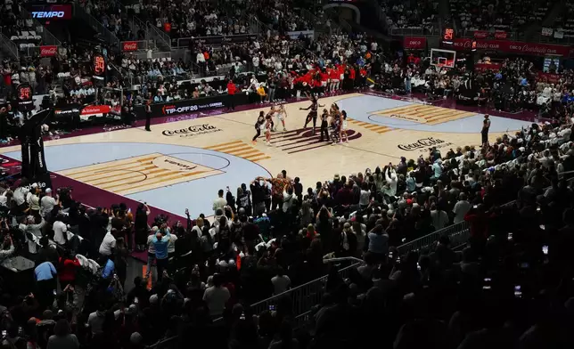 The Toronto Tempo and the Washington Mystics line up for the tip-off at a WNBA basketball game in Toronto, Friday, May 8, 2026. (Nathan Denette/The Canadian Press via AP)