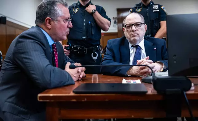 Harvey Weinstein appears with attorney Marc Agnifilo in Manhattan criminal court, Thursday, May 14, 2026, in New York. (Spencer Platt/Pool Photo via AP)