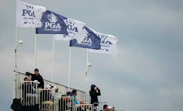 Fans watch on the seventh hole during the second round of the PGA Championship golf tournament at Aronimink Golf Club, Friday, May 15, 2026, in Newtown Square, PA. (AP Photo/Frank Franklin II)