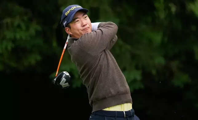 Michael Kim, of South Korea, watches his tee shot on the fourth hole during the first round of the PGA Championship golf tournament practice round at Aronimink Golf Club, Thursday, May 14, 2026, in Newtown Square, PA. (AP Photo/Matt Slocum)