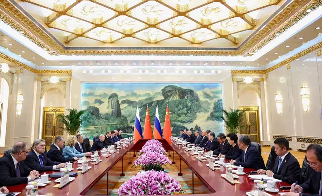 Russian President Vladimir Putin and Chinese President Xi Jinping attend a bilateral meeting at the Great Hall of the People, in Beijing, China, on Wednesday, May 20, 2026. (Alexander Kazakov, Sputnik, Kremlin Pool Photo via AP)