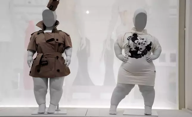 Designs by Burberry, left, and Vivienne Westwood are displayed on Sinéad Burke mannequins in the "Disabled Body" section of the Metropolitan Museum of Art's Costume Institute exhibition, "Costume Art," on Saturday, May 2, 2026, in New York. (Photo by Charles Sykes/Invision/AP)