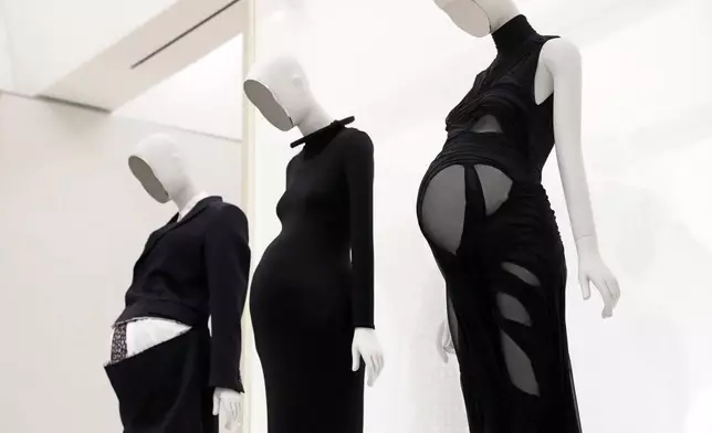 Designs in the "Pregnant Body" section are displayed at the Metropolitan Museum of Art's Costume Institute exhibition, "Costume Art," on Saturday, May 2, 2026, in New York. (Photo by Charles Sykes/Invision/AP)