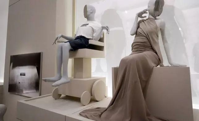 Designs by Willie Norris Workshop on an Aariana Rose Philip mannequin, left, and Rick Owens on a Goddess Bunny mannequin are displayed in the "Disabled Body" section of the Metropolitan Museum of Art's Costume Institute exhibition, "Costume Art," on Saturday, May 2, 2026, in New York. (Photo by Charles Sykes/Invision/AP)