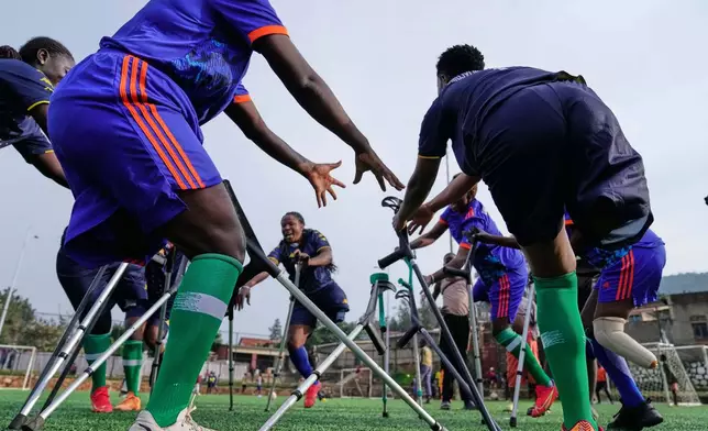 Soccer players on the Rwanda Amputee team take part in a training session in Kigali, Rwanda, on Friday, March 20, 2026. (AP Photo/Brian Inganga)
