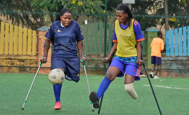 Soccer players on the Rwanda Amputee team play in Kigali, Rwanda, on Friday, March 20, 2026. (AP Photo/Brian Inganga)