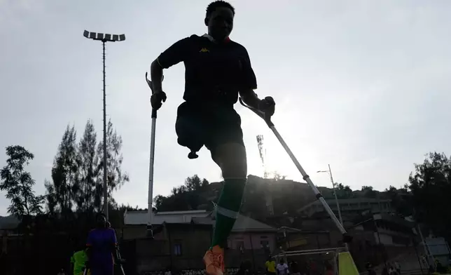 A soccer player on the Rwanda Amputee team takes part in a training session in Kigali, Rwanda, on Friday, March 20, 2026. (AP Photo/Brian Inganga)