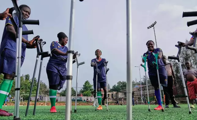 Soccer players on the Rwanda Amputee team take part in a training session in Kigali, Rwanda, on Friday, March 20, 2026. (AP Photo/Brian Inganga)