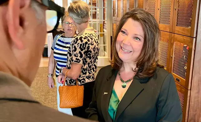 District county clerk Crystal Rhoades speaks at a fundraising event Thursday, April 16, 2026, in Omaha, Neb. (AP Photo/Margery A. Beck)