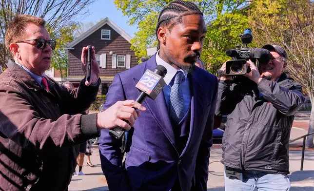 Former New England Patriots wide receiver Stefon Diggs arrives at Norfolk County District Court, Monday, May 4, 2026, in Dedham, Mass. (AP Photo/Charles Krupa)