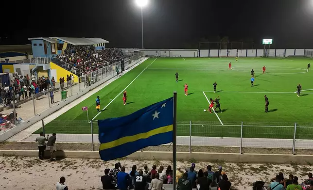 Inter Willemstad and Centro Dominguito play a local league soccer match in Willemstad, Curacao, Friday, May 15, 2026. (AP Photo/Matias Delacroix)