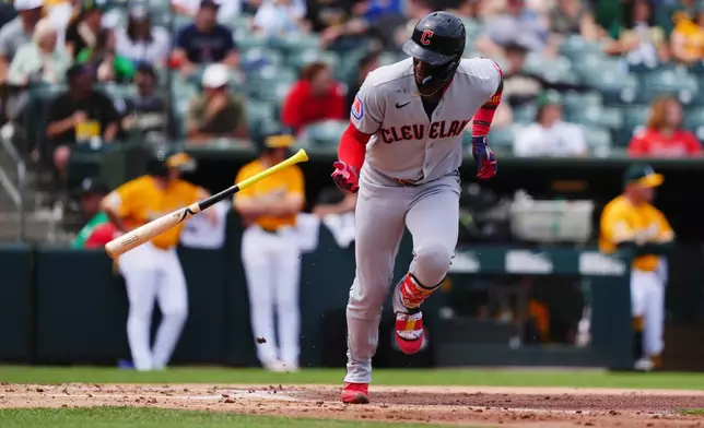 Cleveland Guardians' Angel Martínez starts to run after hitting a single in the third inning of a during a baseball game against the Athletics Saturday, May 2, 2026, in West Sacramento, Calif. (AP Photo/Alan Greth)